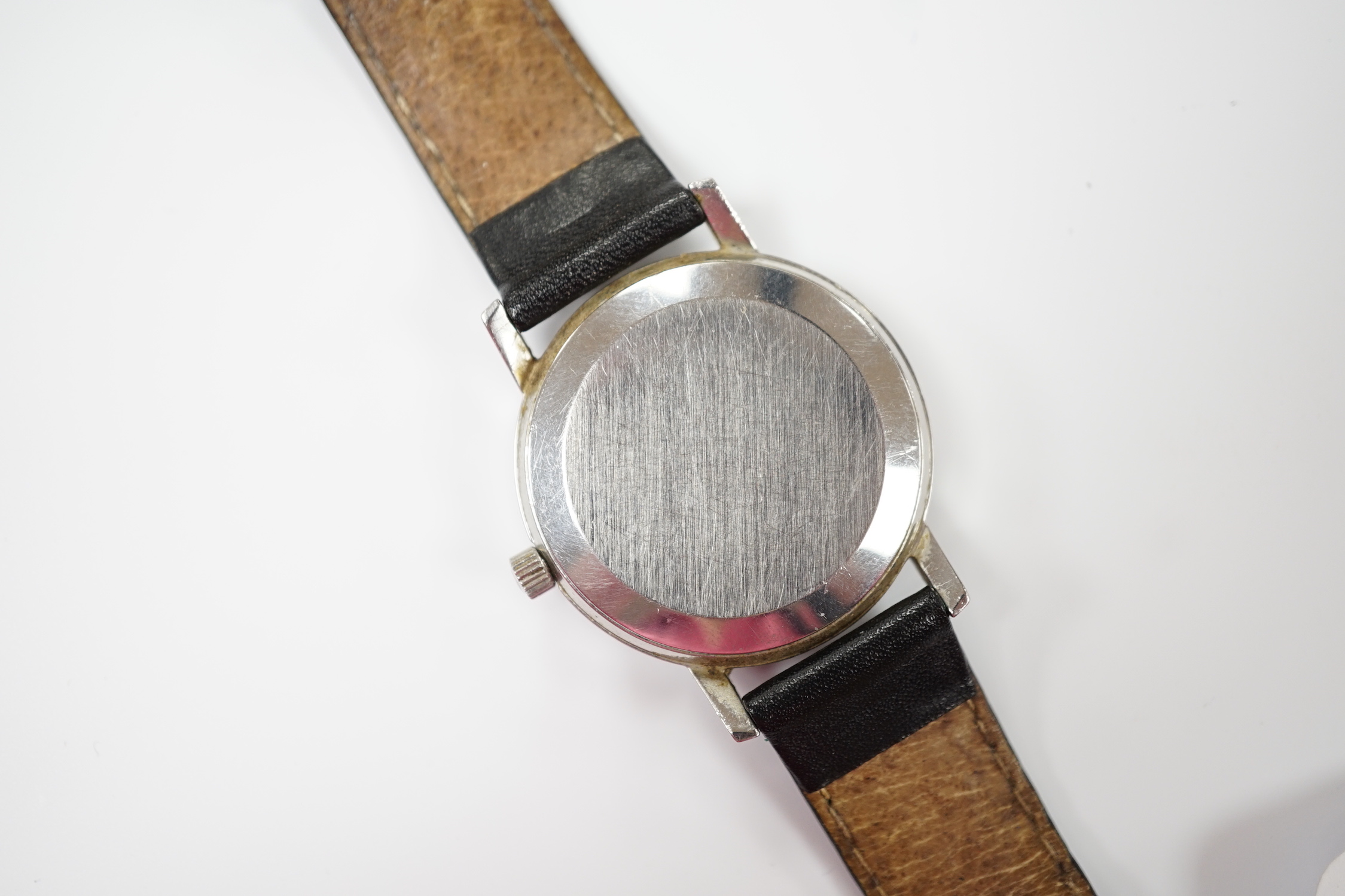 A gentleman's late 1970's stainless steel Omega Seamaster automatic wrist watch, on associated leather strap.